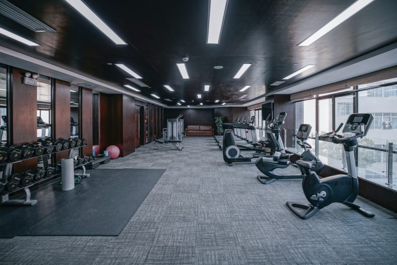 Modern,Light,Gym.,Sports,Equipment,In,Gym.,Barbells,Of,Different