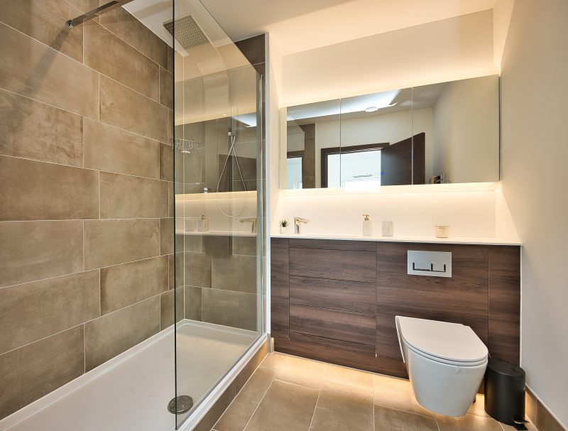 Contemporary,Bathroom,Design,With,Led,Light,Behind,Toilet,Unit,In